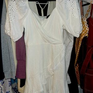 Eyelet Detailed white dress is light weight cotton fabric